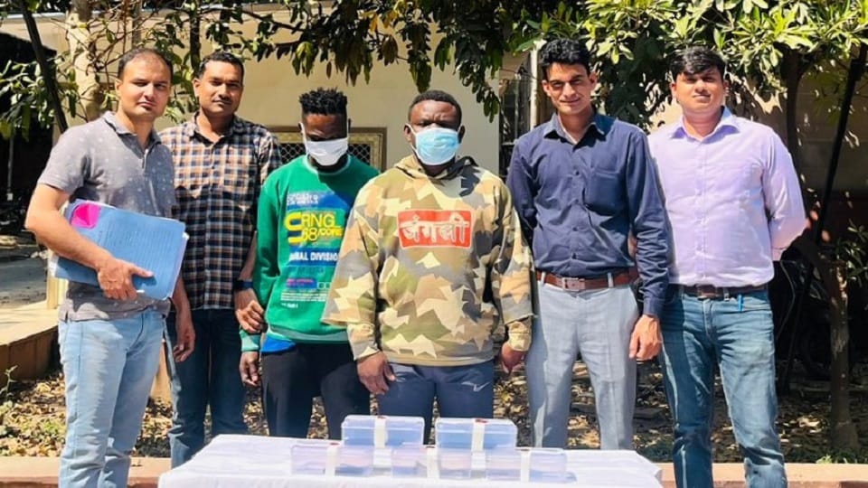 Two Nigerians arrested for cheating on social media