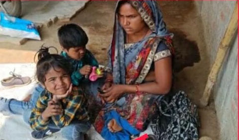 Woman sitting on dharna at her in-laws house with twins
