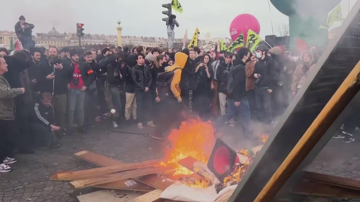 france paris protests against emmanuel macron government over retirement age law