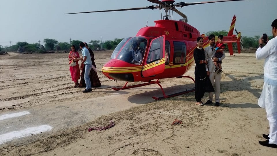 Kurukshetra Grandson fulfills grandfather dream NRI groom arrives with bride by helicopter