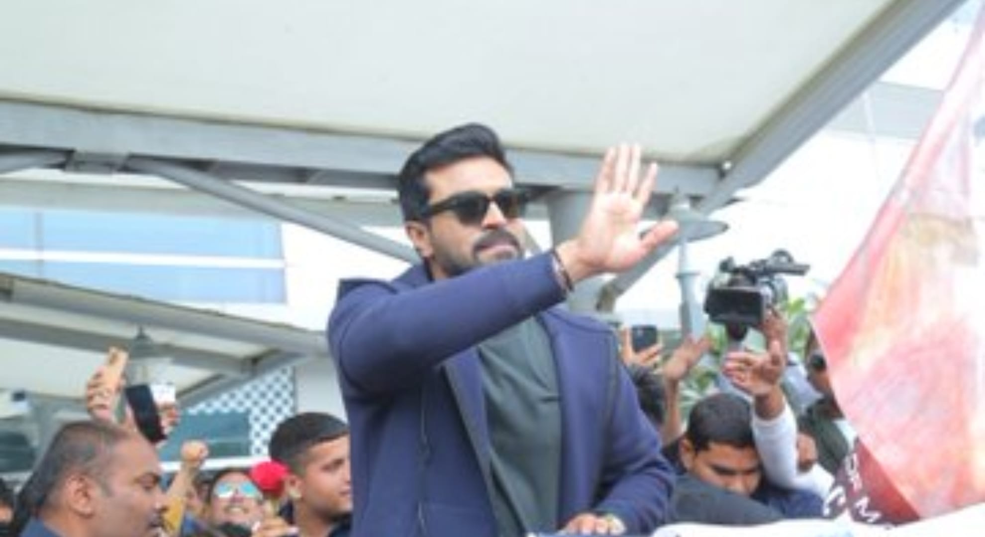 ram charan rc16 first poster released on actor birthday director buchi babu sana say he have heart of gold