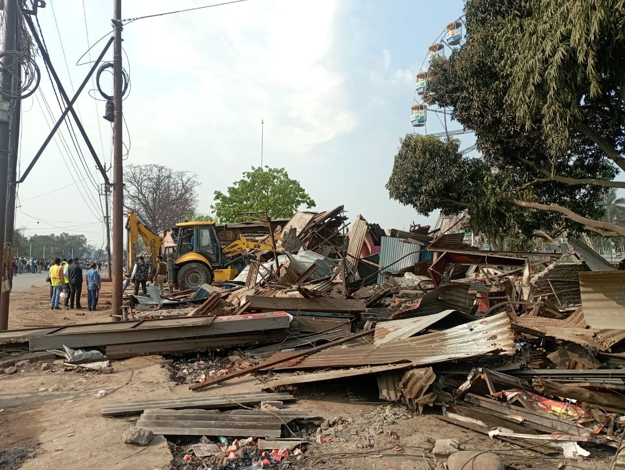 Rudrapur 40 Year Old Market demolished in four and a half hours after Bulldozer run over shop on NH 87