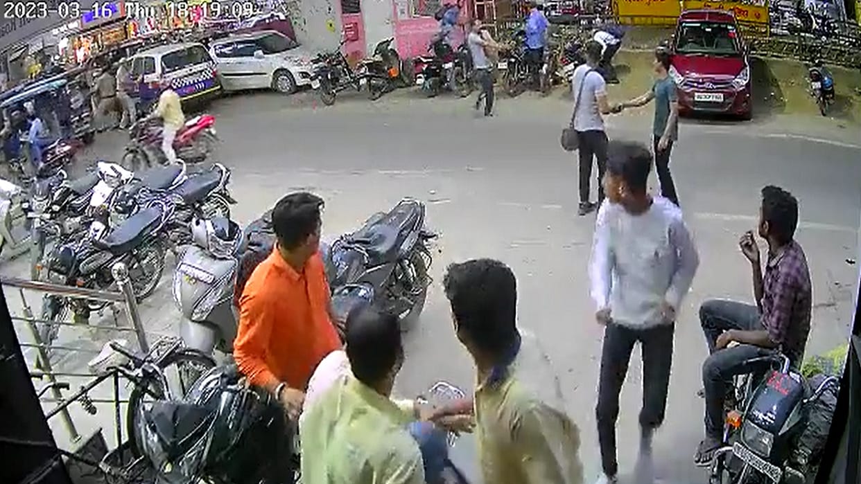 After slitting throat ran in a crowded area with a gun