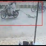 कुत्ते को घसीटते हुए ले जाता इस्माइल