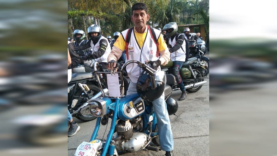 Taj Bike Rally 67 year old Islamuddin is riding his 49 year old bobby mini bike
