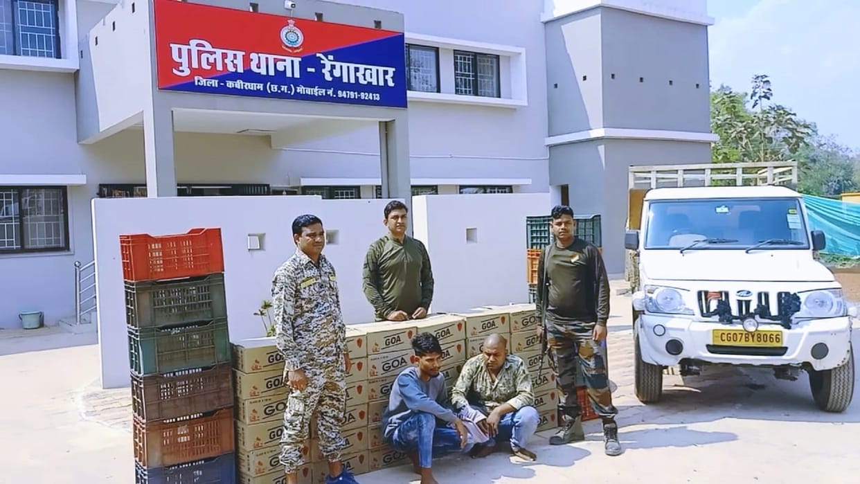 Police arrested two for hiding liquor in vegetable carat in Bolero car