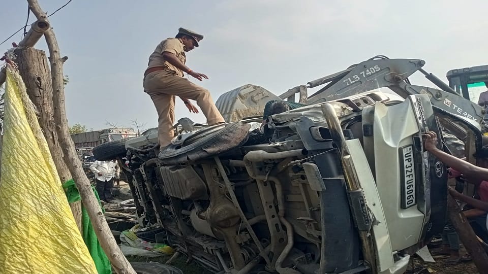 tyre of a moving car in burst overturned several times and collided with tractor Two killed and seven injured