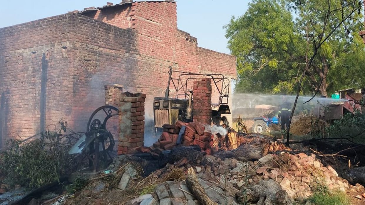 Two sides fighting in land dispute, fire in crop and tractor, force deployed in village