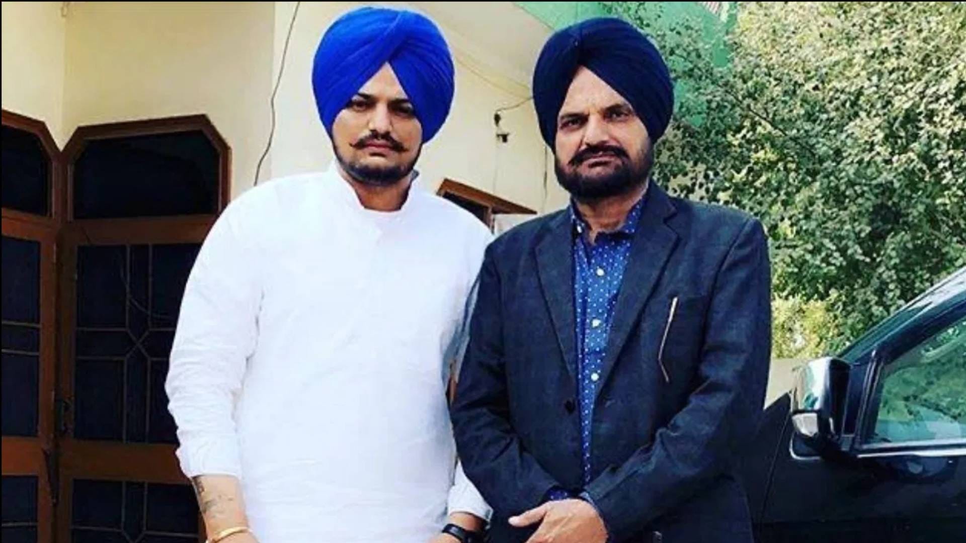 video of Sidhu Moosewala father and newborn brother pictures being shown at Times Square New York