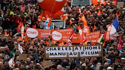 French workers block train tracks during pension reform protests