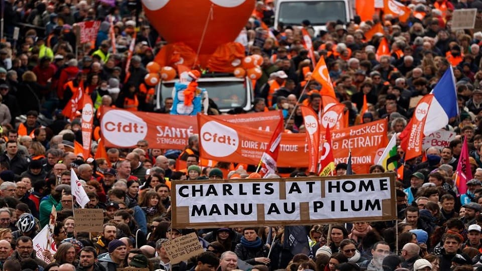 French workers block train tracks during pension reform protests