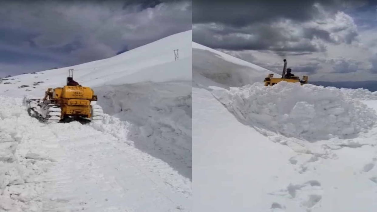 Dodra Kwar road restored by cutting six feet high wall of snow