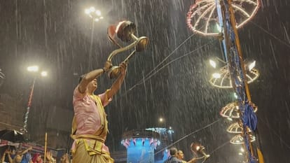 Rain in varanasi in midway of ganga aarti amazing view seen at Dashashwamedh Ghat