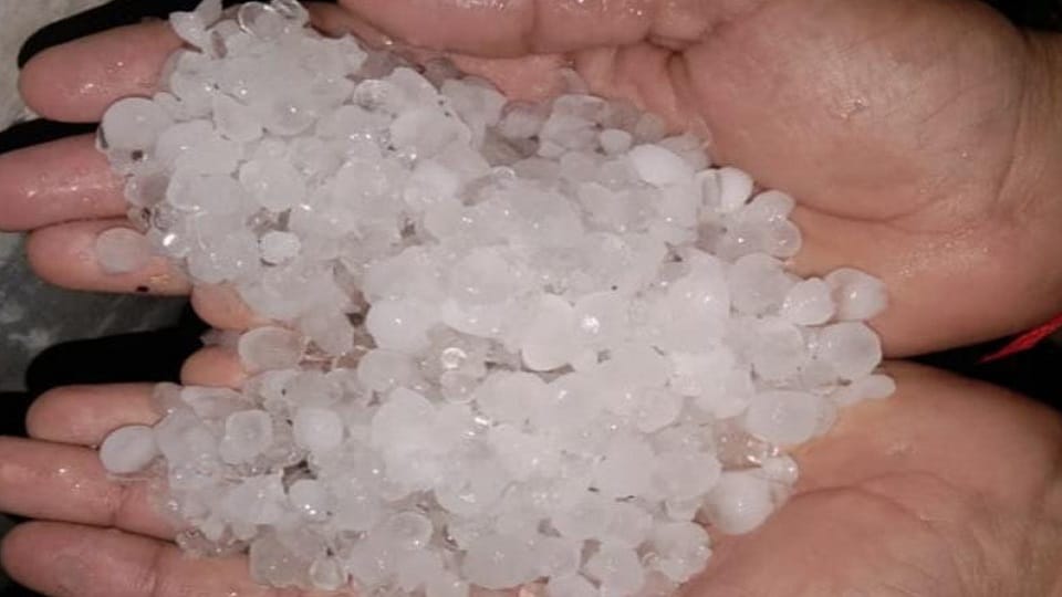 rain hail accompanied by strong wind