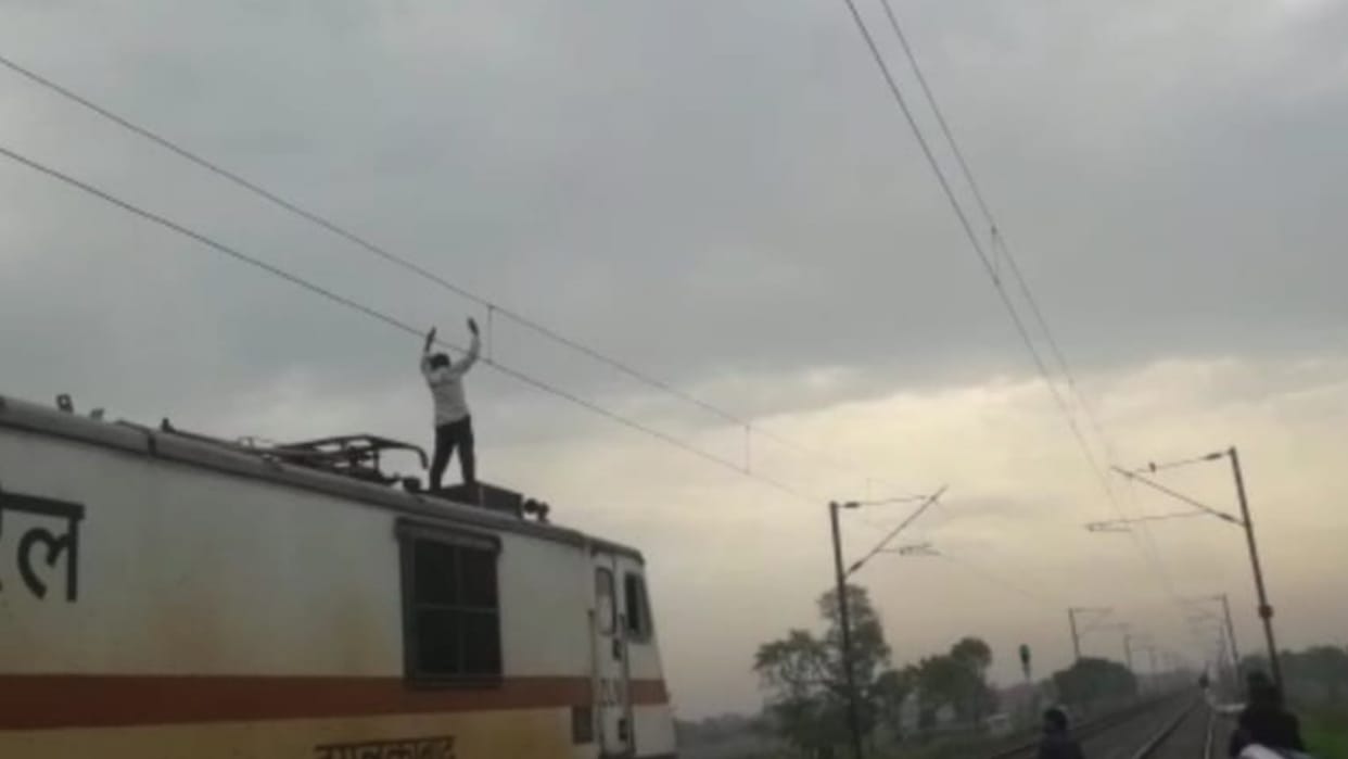 A man climbed up on train and died after touching the electricity line in Bahraich.