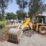 अवैध निर्माण पर चला बुलडोजर