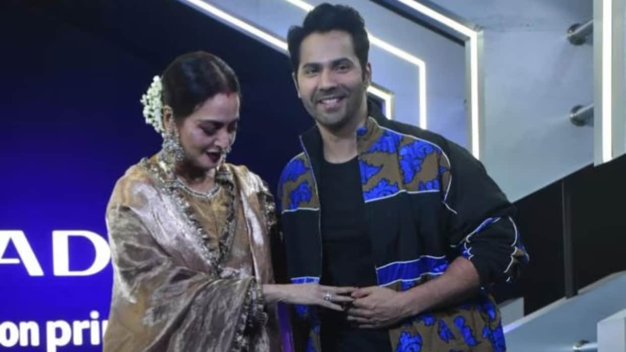 varun dhawan grabs natizens attantaion posing with rekha at citadel premiere after gigi hadid kissing row read