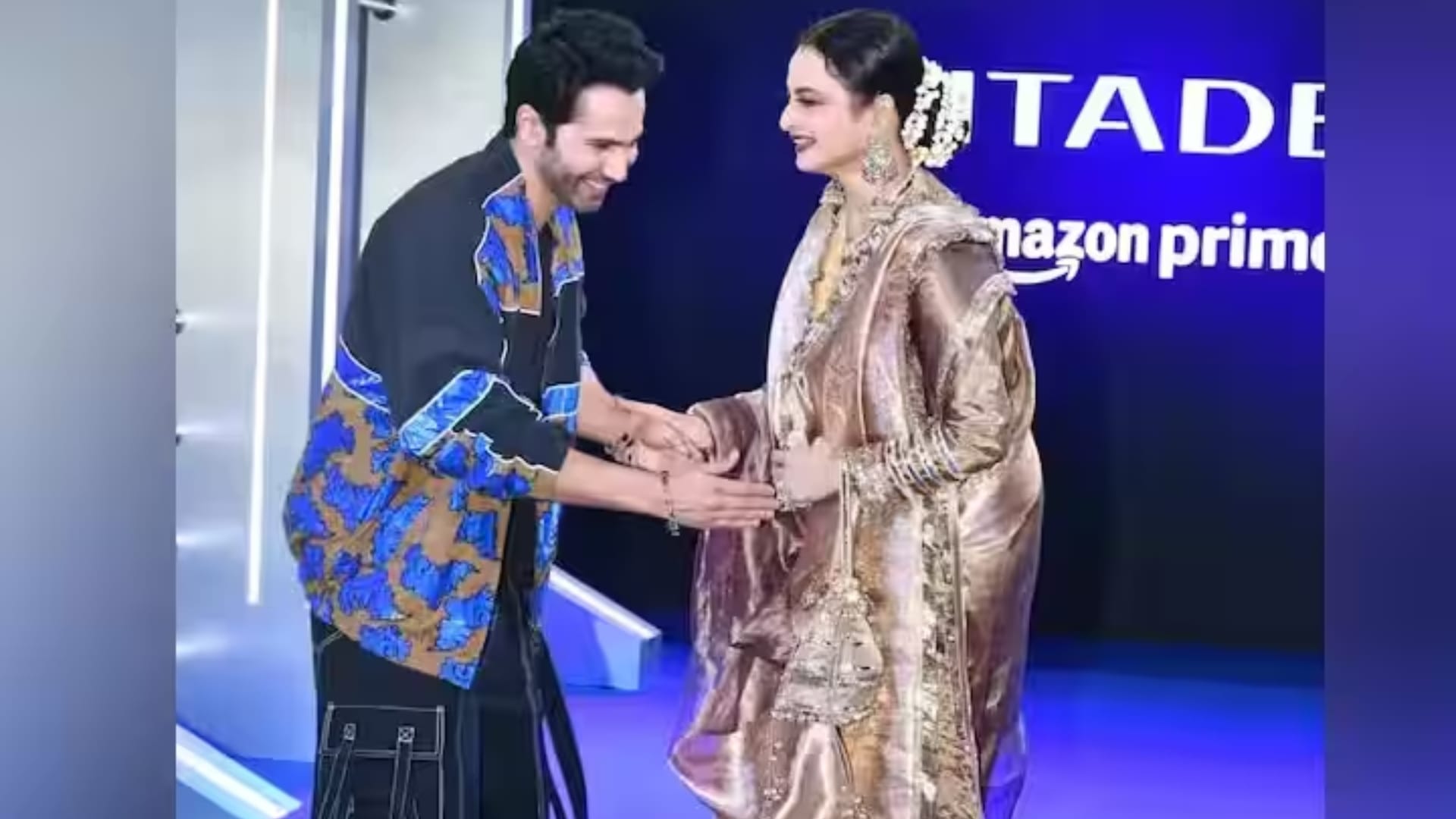 varun dhawan grabs natizens attantaion posing with rekha at citadel premiere after gigi hadid kissing row read
