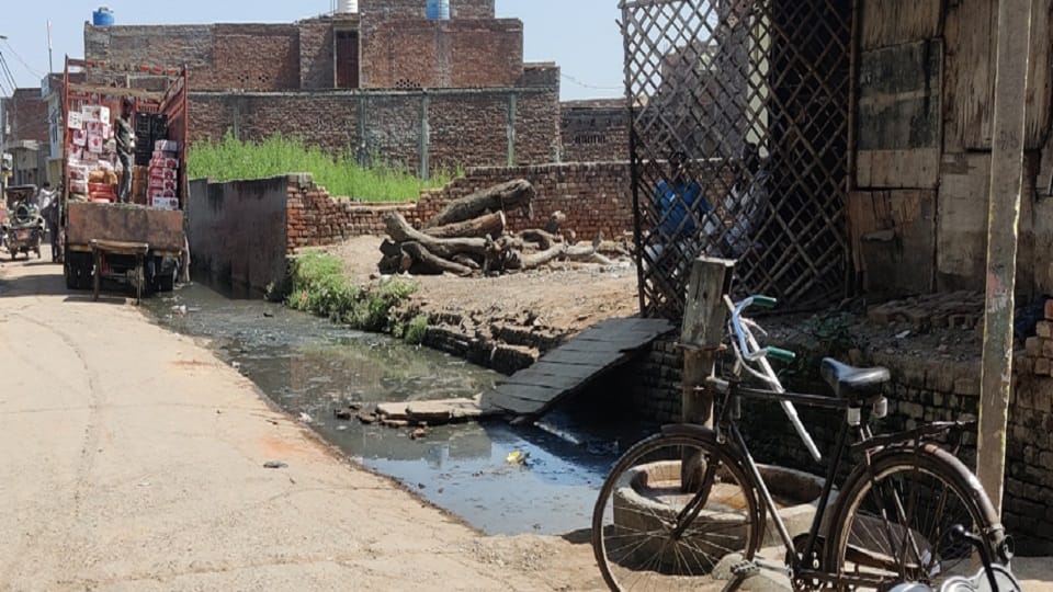 sludge coming out of drain in chharra
