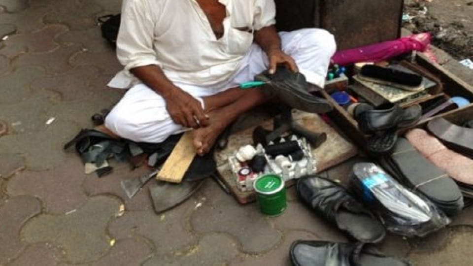shoe repairman had Verma written on his name plate a lawyer threatened to remove it