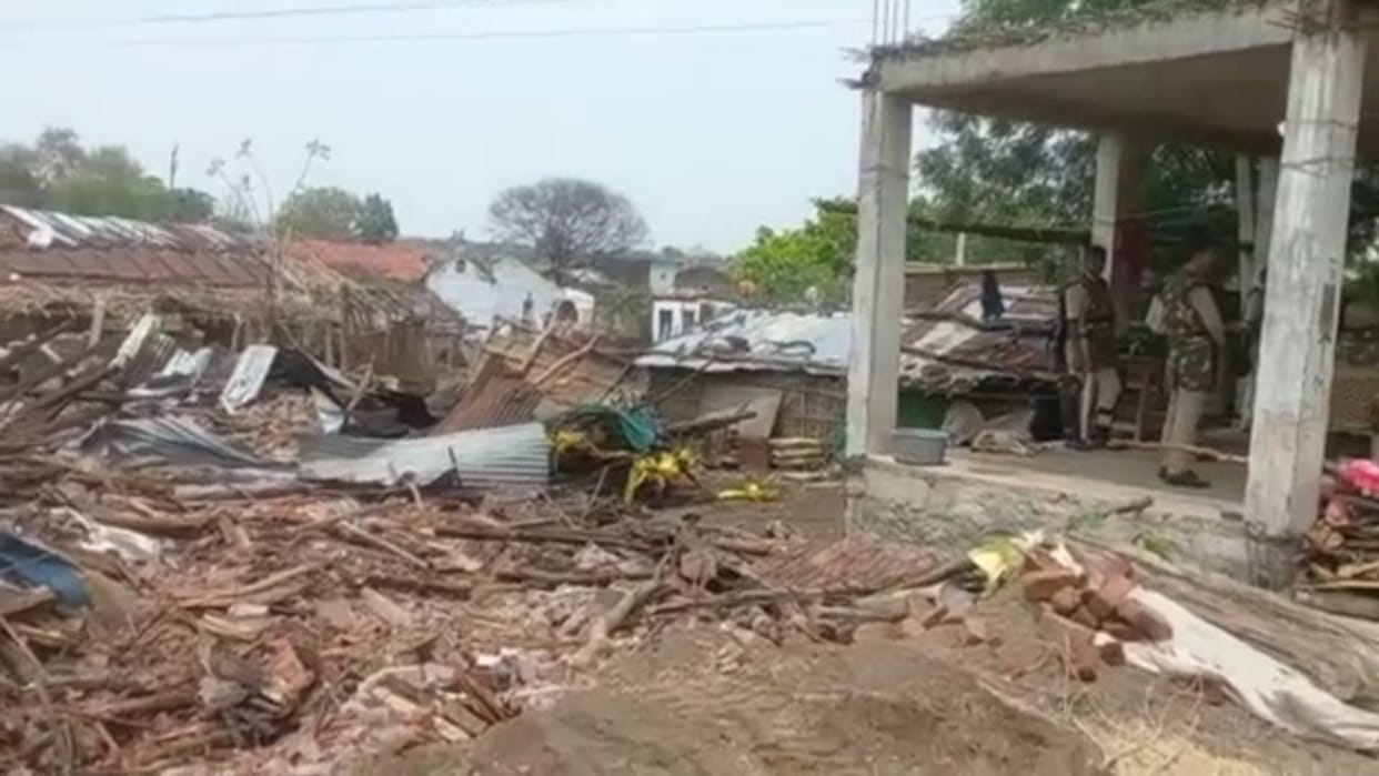 Police demolished houses of forest encroachers with bulldozers in Burhanpur