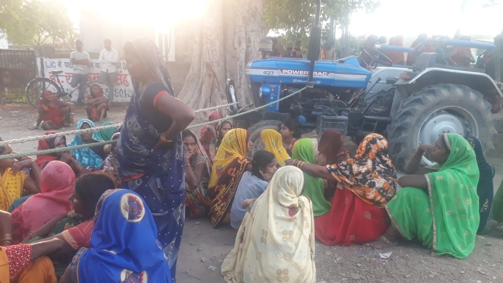 tractor trolley crushed scooty riders in varanasi two children died and one injured