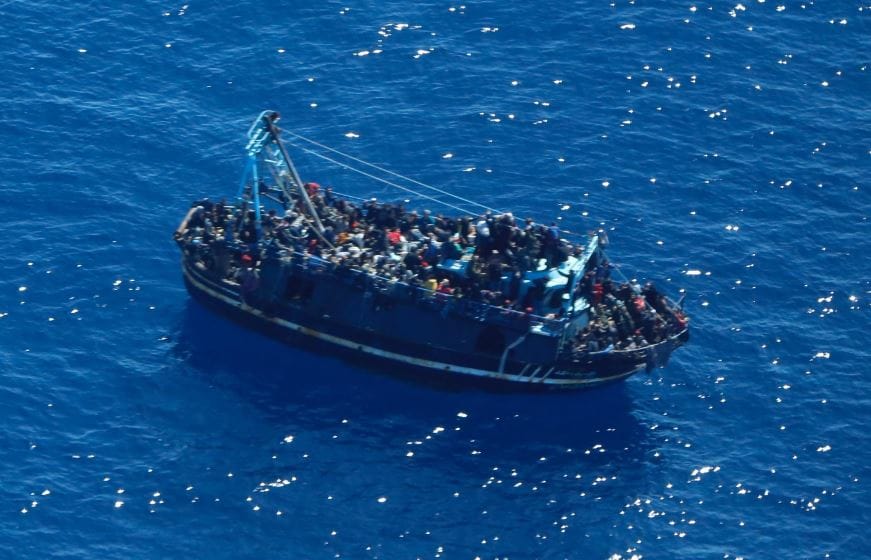 Boat with around 400 people on board is adrift between Greece and Malta and is taking on water