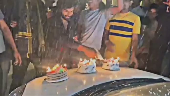 Cake cut with pistol on the bonnet of the car in Mahoba, friends were clapping, now police action will be take