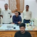 पुलिस गिरफ्त में आरोपी।