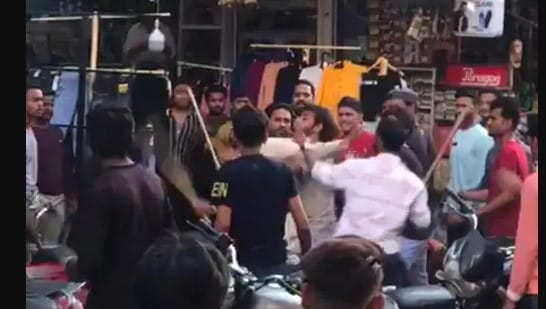 In the dispute between two shopkeepers traders fiercely kicked and punched