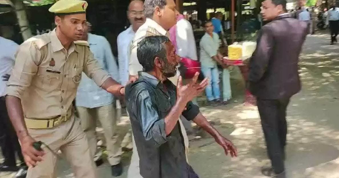 Man attempts self immolation in varanasi court premises after dispute with wife