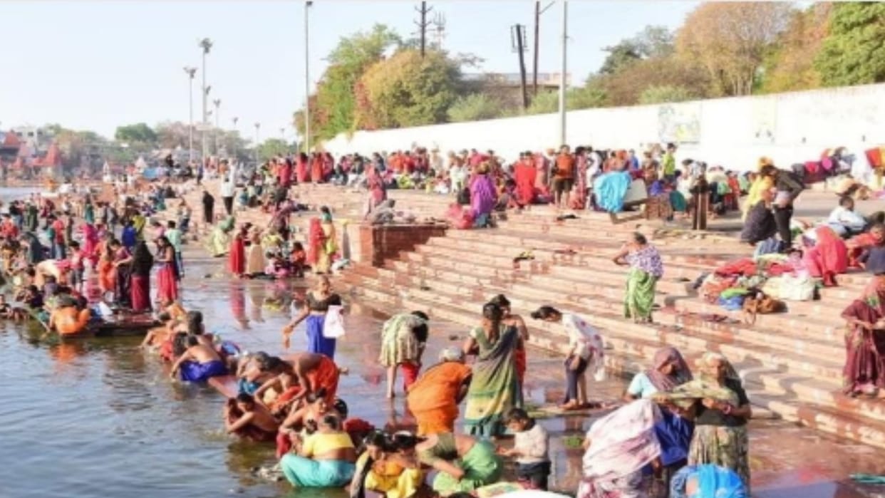 Panchkoshi pilgrims take a dip of faith at Ramghat, a fair of believers in the city of Mahakal