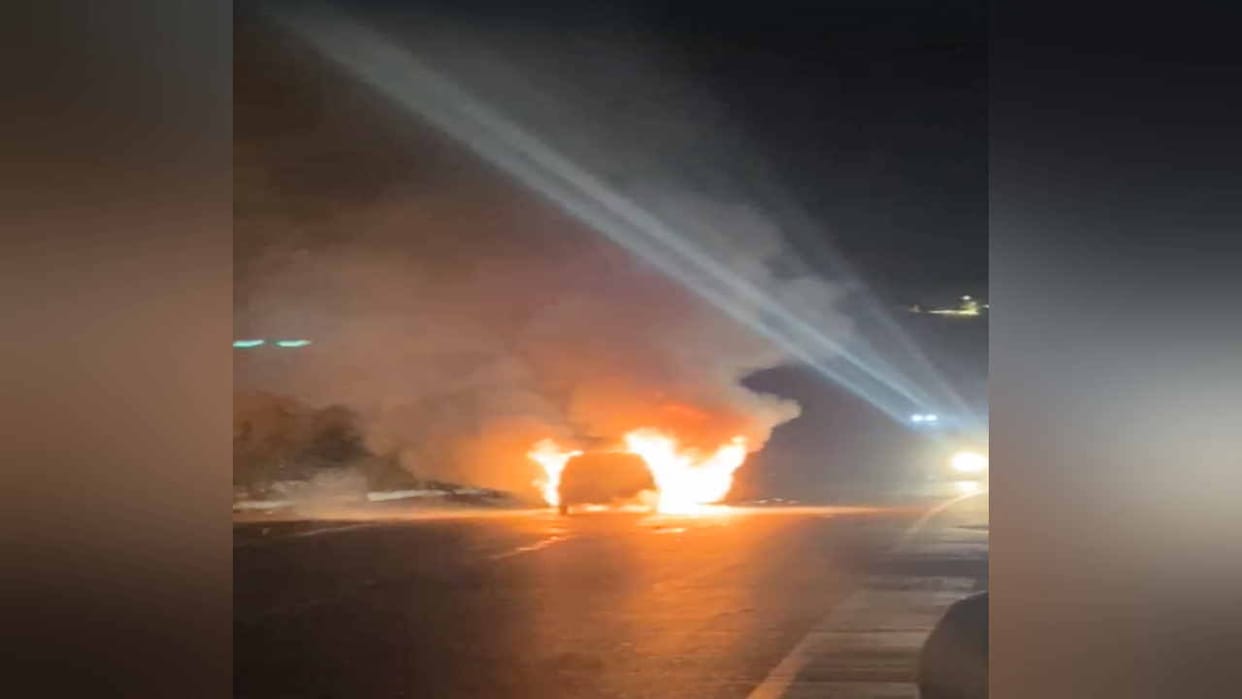 Car caught fire after being hit by a boulder that suddenly fell from a hill near Manali