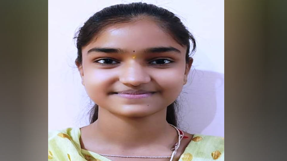 student Megha brought laurels to family by securing eighty nine percent marks in Intermediate in Kasganj