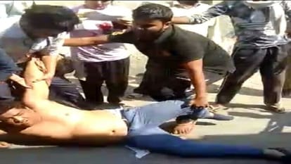 Filled market youth beaten up Police remained mute spectators