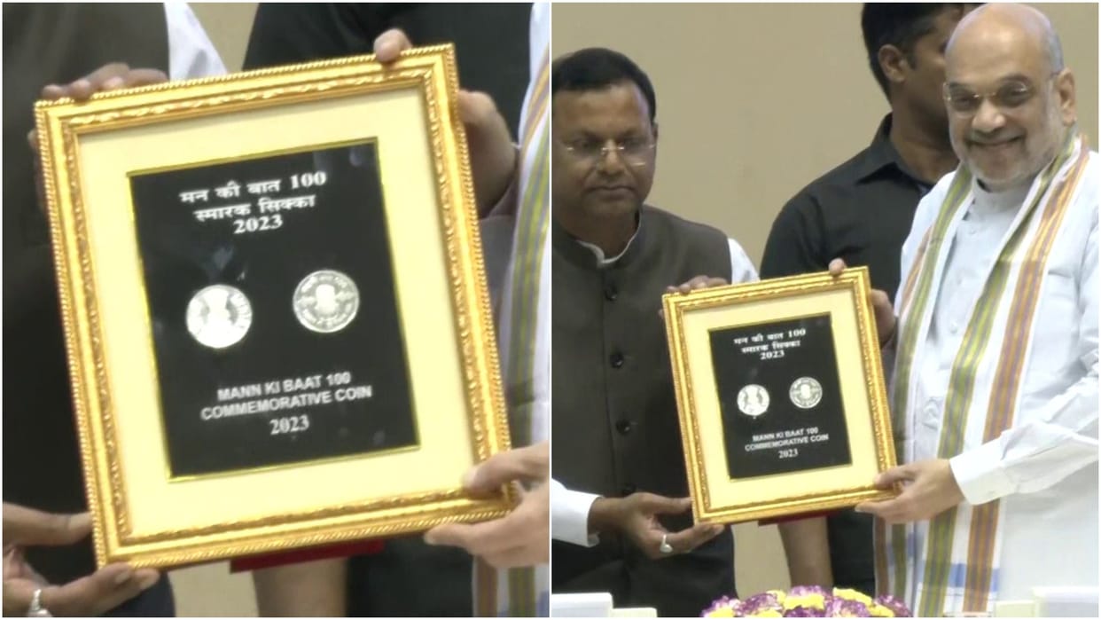 Union Home Minister Amit Shah releases commemorative coin at the National Conclave on Mann Ki Baat@100