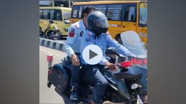 Jammu: Traffic police personnel going on bike without helmet DSP issue challan