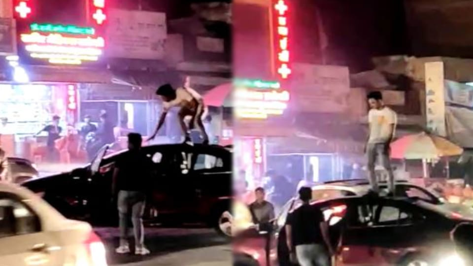 some youths created ruckus by parking their car on middle of road this led to long jam In Agra