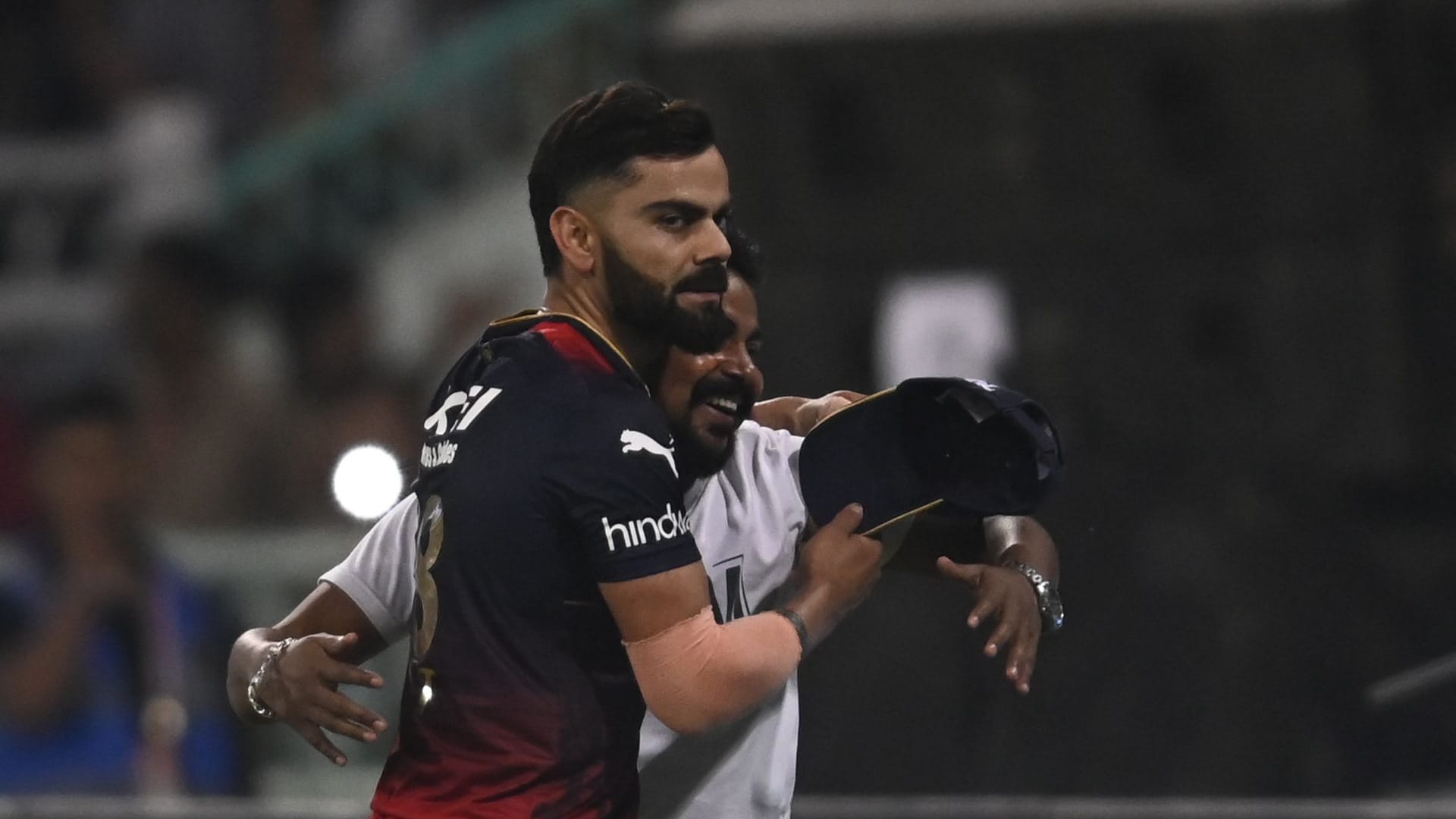 A fan came near to Virat Kohli.