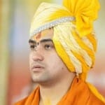 शिक्षा मंत्री चंद्रशेखर और कथावाचक धीरेंद्र शास्त्री