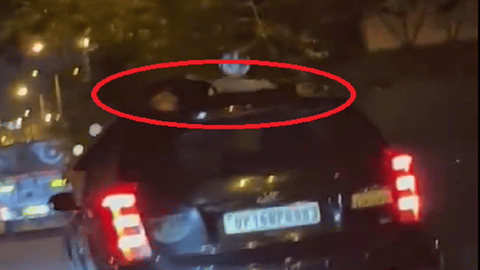 car hit two bike riders at KG Marg red light delhi viral video