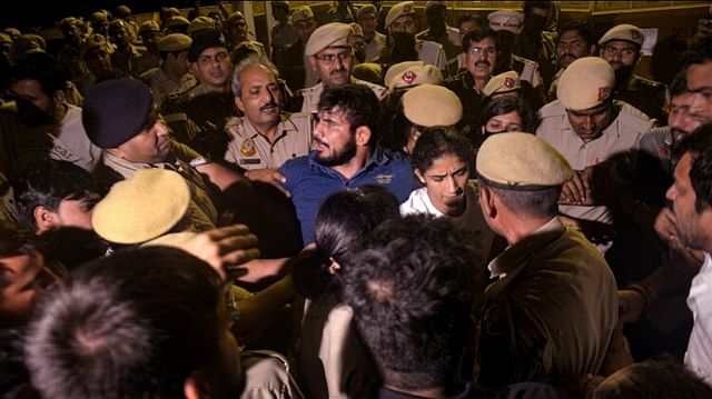 Wrestler Protest Vinesh Sakshi Wept After Clash With Delhi Police Bajrang’s Wife Sought Support See Photos