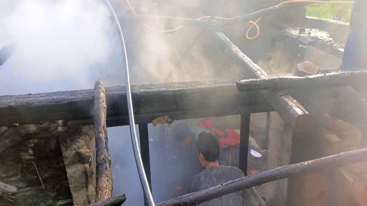 house and cow shed burnt to ashes in , couple and five cattle in patlikuhal