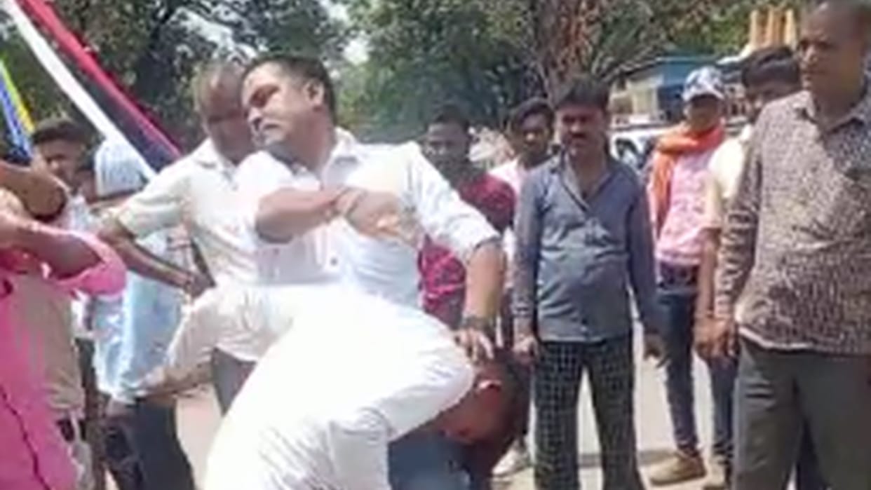 chhattisgarh Police officer beat two boys for delay in removing bike from road in balrampur