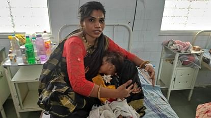 Indore, MP, IndiaMother tightly held the bus seat by hiding one and a half year old daughter in her lap, both