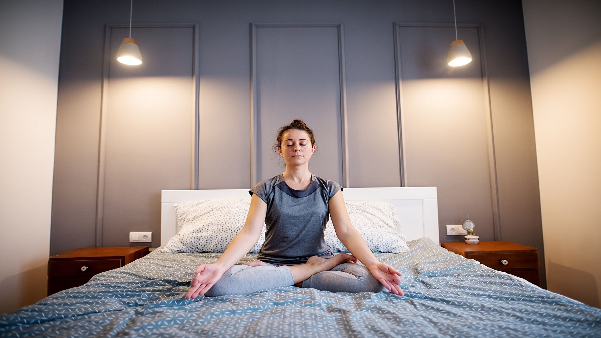5 Yoga Poses You Can Do Before You Get Out of Bed - DoYou