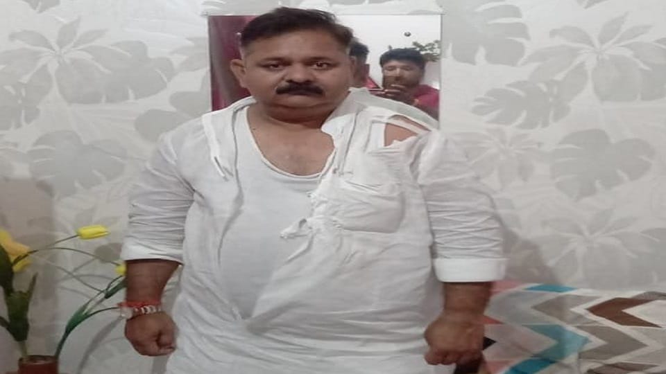 outgoing chairman of Harduaganj Tilak Raj beaten up