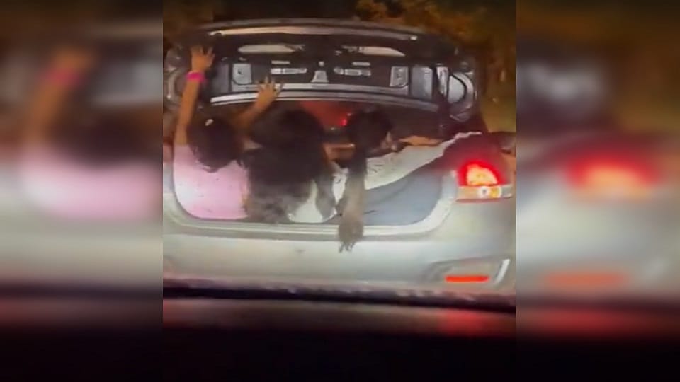 Stunt of three girls sitting in car trunk in Ghaziabad goes viral