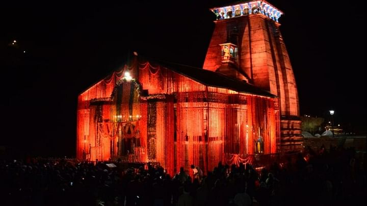 Char Dham Yatra 2023 Kedarnath temple shining with colorful lights at night Huge crowd of devotees Photos