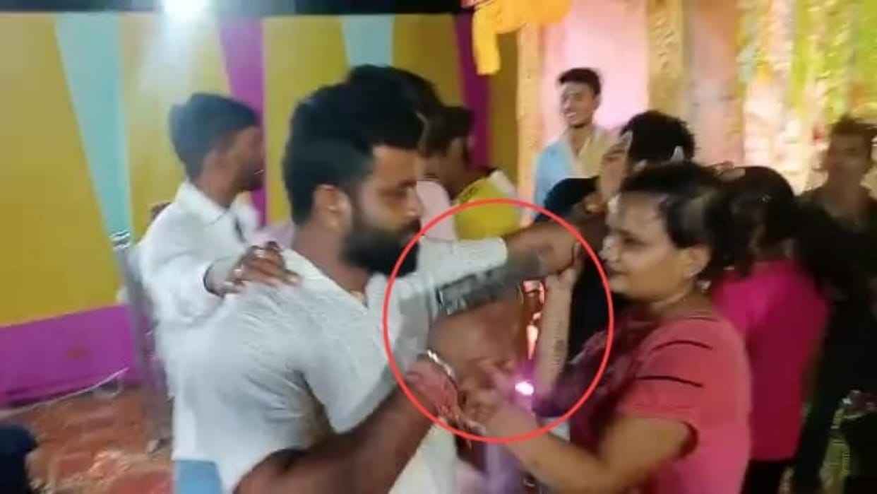 A young man was seen waving arms at a wedding in Motihari, pointed pistol at a dancer dancing in orchestra